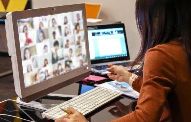 Female teacher are using computer laptop for online teaching students or online elearning ormeetings with webex or zoom program application.