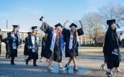 A group of students walk on ODU's campus.