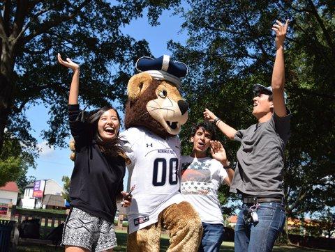 Student cheering Big Blue